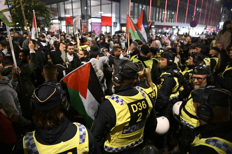 Police face pro-Palestinian protesters in central Malmo during the Eurovision Song Contest in the Swedish city. Contest organisers have refused demands for Israel to be excluded over the war in Gaza. AFP