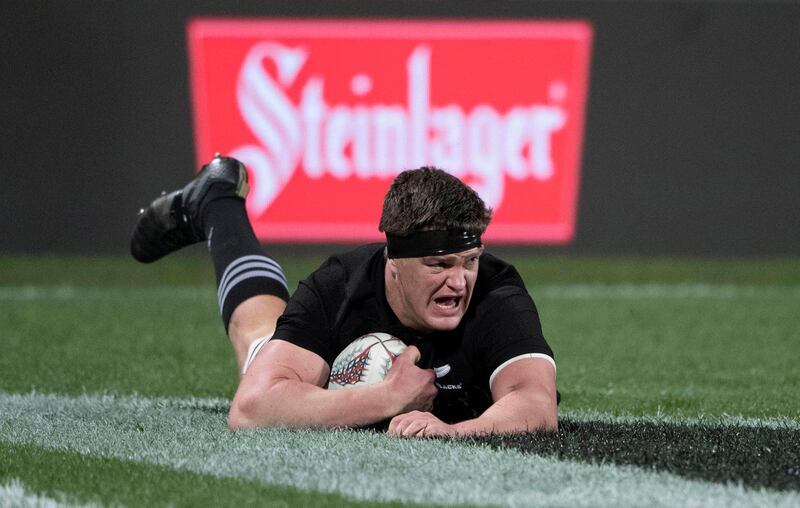 New Zealand's Scott Barrett scores a try against South Africa during their Rugby Championship match in Auckland, New Zealand, Saturday, Sept. 16, 2017. The All Blacks defeated the Springboks 57-0. (Brett Phibbs/New Zealand Herald via AP)