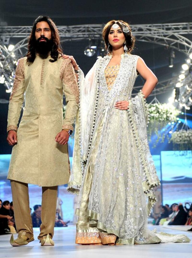 Models present creations by designer Zainab Chottani. Rizwan Tabassum / AFP photo