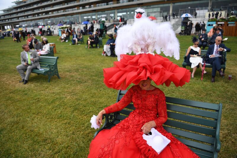 A woman in a decorative hat on day three of Royal Ascot, in Ascot, Britain. EPA