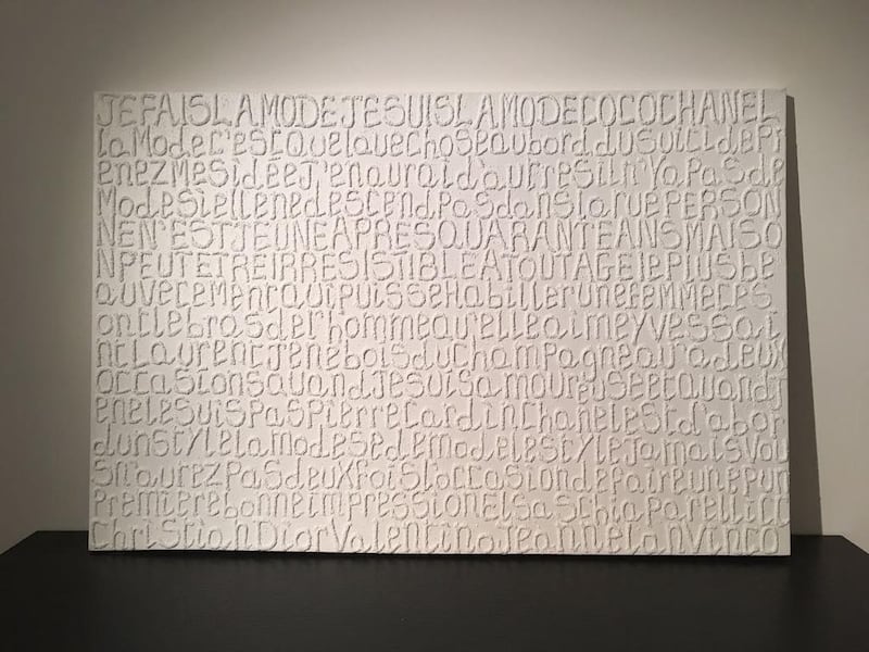 Sand Talks, by Francesca Matarazzo di Licosa. A form of artistic expression which features sequences of words and symbols laid out with apparent randomness.