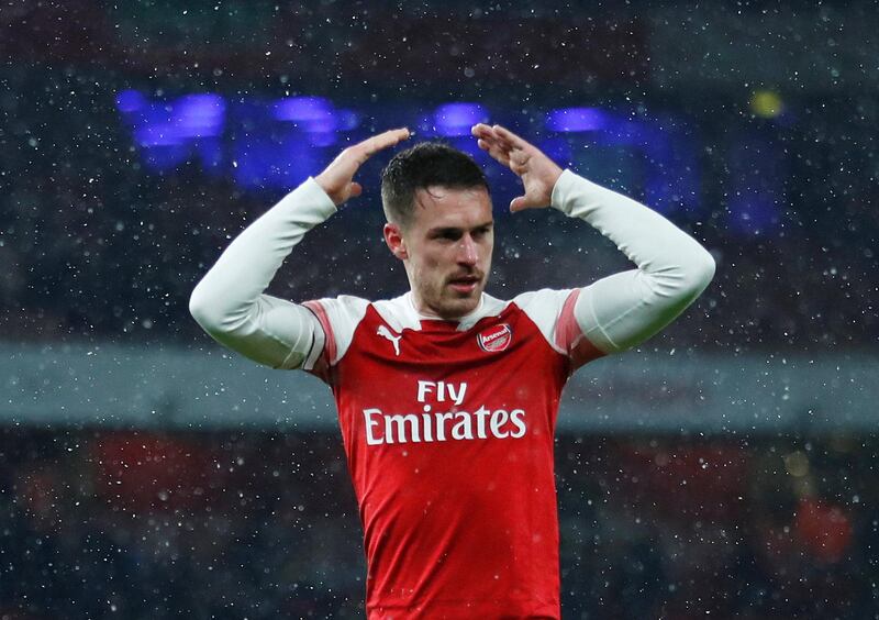 Soccer Football - Premier League - Arsenal v Cardiff City - Emirates Stadium, London, Britain - January 29, 2019  Arsenal's Aaron Ramsey gestures to Cardiff City fans after the match                REUTERS/Eddie Keogh  EDITORIAL USE ONLY. No use with unauthorized audio, video, data, fixture lists, club/league logos or "live" services. Online in-match use limited to 75 images, no video emulation. No use in betting, games or single club/league/player publications.  Please contact your account representative for further details.