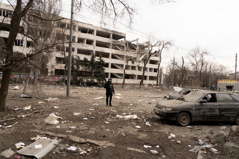 Associated Press photographer Evgeniy Maloletka stands amid rubble of an airstrike on Pryazovskyi State Technical University in Mariupol, Ukraine. AP