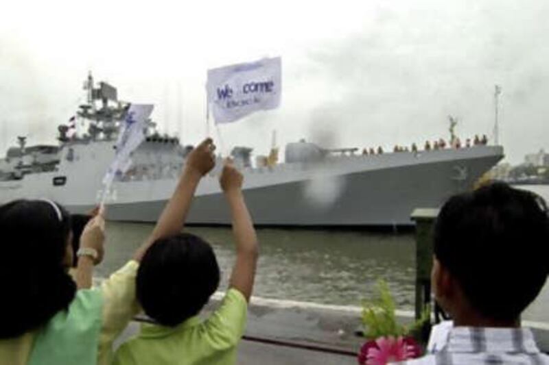 This July 31 2004 file photograph shows Indian naval ship INS Tabar, a stealth frigate being received by family members and children of Indian naval personnel as it arrives in Mumbai, India. The Indian naval vessel INS Tabar sank a suspected pirate "mother ship" in the Gulf of Aden and chased two attack boats into the night, officials said.