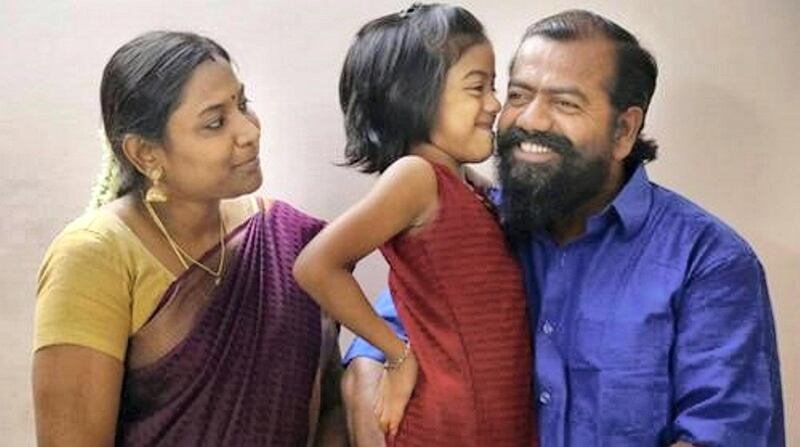 Capt Ayyappan Swaminathan at home in India with his wife Menaga and daughter Aniha. The merchant sailor was trapped for 18 months on the MV Azraqmoiah vessel off the cost of Sharjah due to a financial dispute with his employer. Courtesy Mission to Seafarers