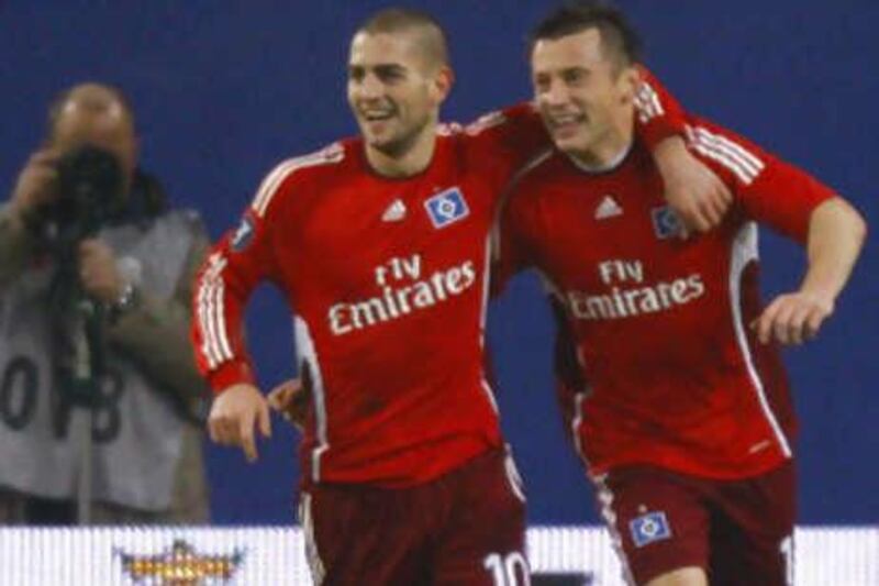 Hamburg's Mladen Petric and Ivica Olic, right, celebrate the latter's goal against Aston Villa.