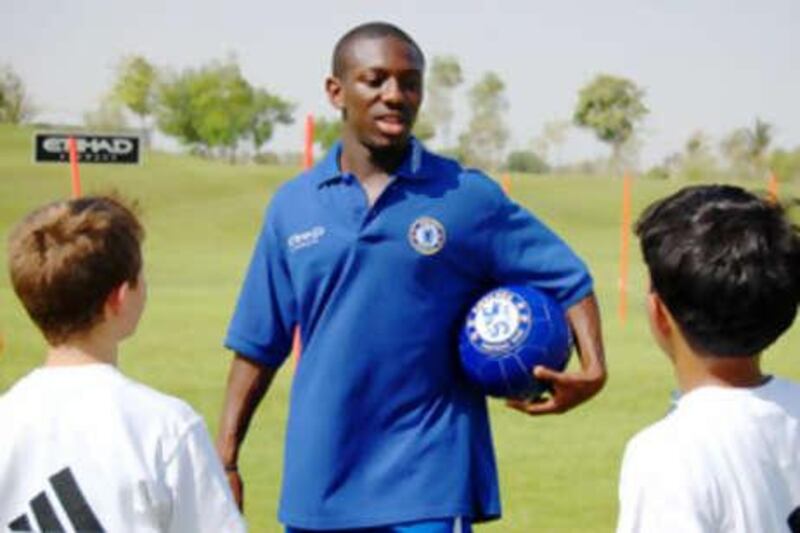 Shaun Wright-Phillips participates in a coaching clinic with local boys from the Football For All Academy, the clinic was held at Emirates Palace in Abu Dhabi in June.