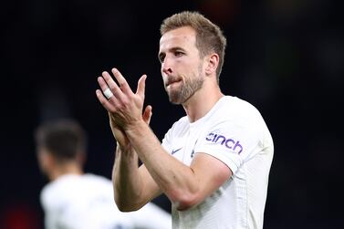 LONDON, ENGLAND - MAY 12: Harry Kane of Tottenham Hotspur applauds the fans after the Premier League match between Tottenham Hotspur and Arsenal at Tottenham Hotspur Stadium on May 12, 2022 in London, England. (Photo by Clive Rose / Getty Images)
