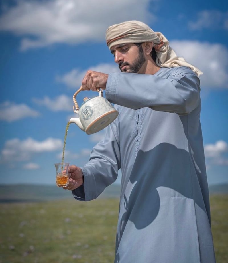 Sheikh Hamdan takes tea on a visit to Mongolia.