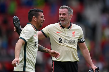 MANCHESTER, ENGLAND - MAY 21: Jamie Carragher of Liverpool celebrates with Mark Gonzalez after the Legends of the North match between Manchester United and Liverpool at Old Trafford on May 21, 2022 in Manchester, England. (Photo by Gareth Copley / Getty Images)