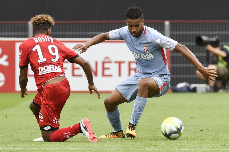 Monaco's French midfielder Thomas Lemar (R) vies with Dijon's French defender Valentin Rosier (L) during the French L1 football match between Dijon FCO and AS Monaco, on August 13, 2017 at Gaston Gerard stadium in Dijon, northern France. / AFP PHOTO / PHILIPPE DESMAZES