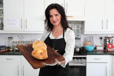 Elli Kriel preparing bread in the kitchen of her Dubai villa. Pawan Singh / The National