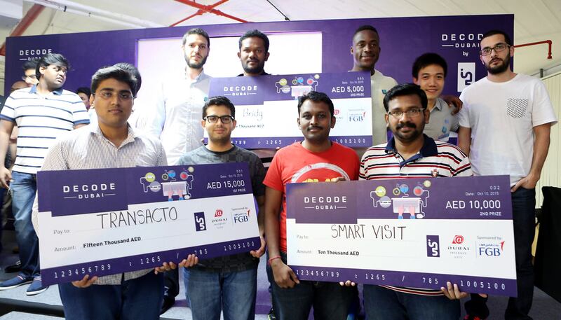 Winners of the Hackathon Transacto with Smart Visit (second) and Bridg (third) at the Decode Dubai event. Pawan Singh / The National