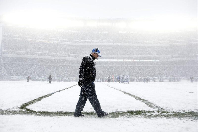 Detroit head coach Jim Schwartz stalks the snowy sidelines in Philadelphia. Matt Rourke / AP