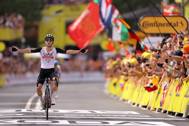UAE Team Emirates' rider Adam Yates crosses the finish line to win the opening stage of the Tour de France in Bilbao, northern Spain. AFP