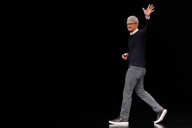 Tim Cook, chief executive of Apple, waving at the audience at a special event at the Steve Jobs Theater in Cupertino, where company announced its new digital services. Reuters