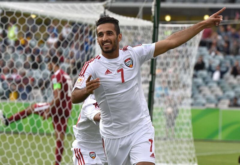 Ali Mabkhout  of UAE celebrates after scoring  during their Group C Asian Cup football match between UAE and Qatar in Canberra on January 11, 2015. AFP 