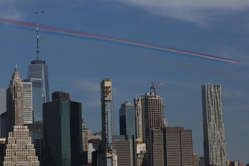 The Royal Air Force Red Arrows from the United Kingdom, U.S. Air Force Thunderbirds and F-35 Lightning II Demo Team fly past the One World Trade building in New York, U.S.   Reuters