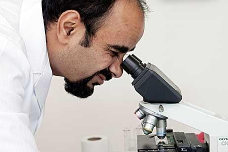In one of the research laboratories at Dubai Pharmacy College, the associate professor Dr Aliasgar Shahiwala studies the shape and size of nano-particles.