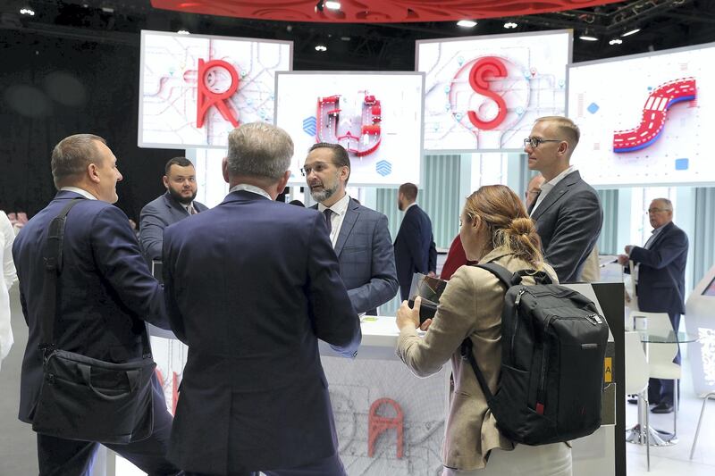 ABU DHABI,  UNITED ARAB EMIRATES , OCTOBER 6 – 2019 :- Delegates at the Russia stand during the 26th World Road Congress exhibition held at Abu Dhabi National Exhibition Center in Abu Dhabi. ( Pawan Singh / The National ) For News. Story by Patrick