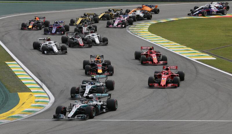 Lewis Hamilton leads at the start of the race. Reuters