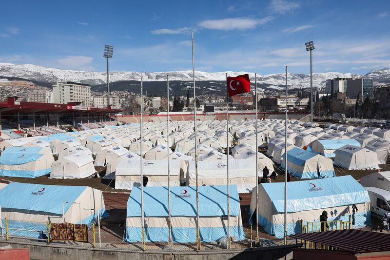 A tent camp has been set up at a stadium in south-eastern Turkish city of Kahramanmaras to shelter families whose homes were destroyed in the quake. AFP