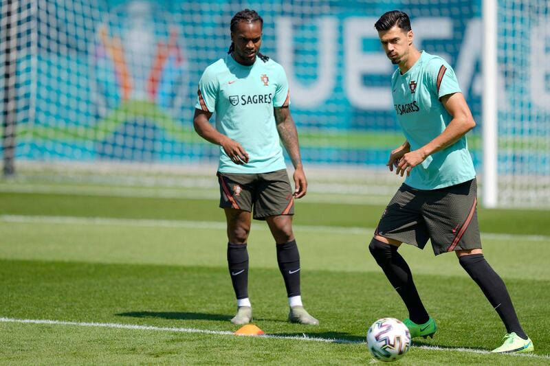 Portugal's players Renato Sanches, left, and Jose Fonte. EPA