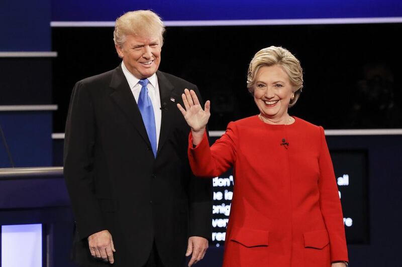 Republican presidential nominee Donald Trump and Democratic presidential nominee Hillary Clinton are introduced during the presidential debate at Hofstra University (AP Photo/David Goldman)
