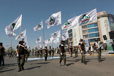 Iraq's Popular Mobilisation Forces march in Baghdad, Iraq. AP