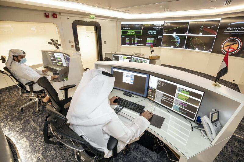 DUBAI, UNITED ARAB EMIRATES. 27 JULY 2020. MBRSC headquarters in Al Khawaneej. One week today since the Hope probe launched to Mars. LtoR: Mohammed Alblooshi, Flight Controller and Hamad Alhazami, Command and Control operator. (Photo: Antonie Robertson/The National) Journalist: Sarwat Nasir. Section: National.