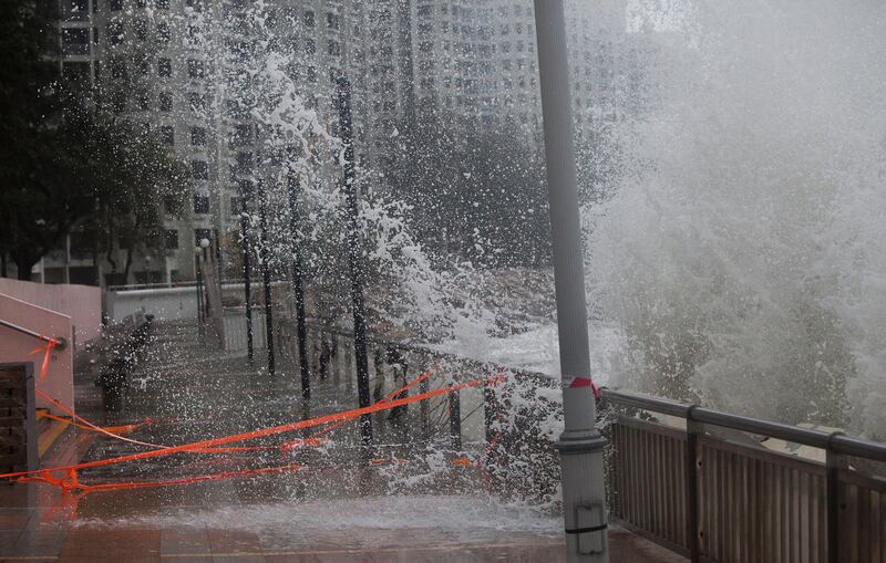 Large waves crash against a sea wall by a housing estate in Heng Fa Chuen during the passing of tropical storm Pakhar in Hong Kong. Alex Hofford / EPA