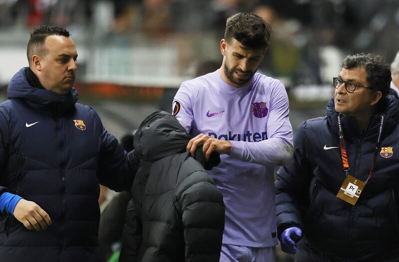 Gerard Pique of Barcelona comes off injured during the Europa League quarter-final against Eintracht Frankfurt. EPA