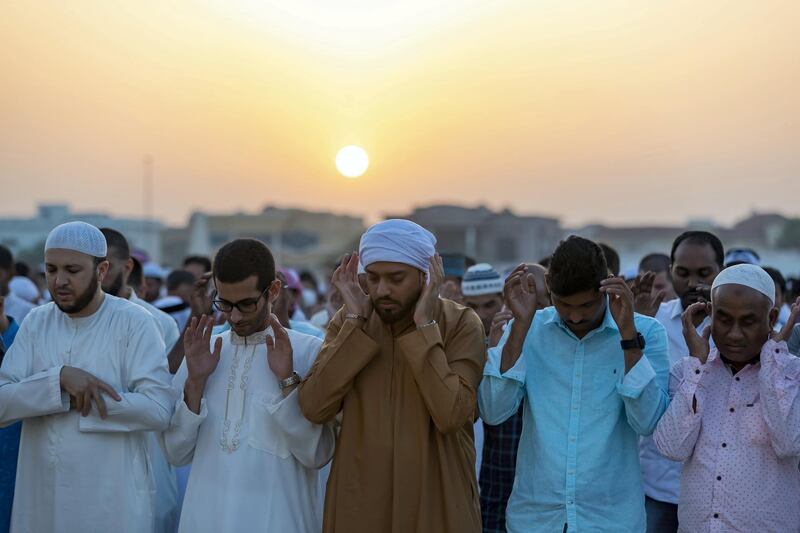 Dubai, United Arab Emirates - June 04, 2019: The first Eid prayer is performed at the Eid prayer ground. Tuesday the 4th of June 2019. Al Barsha, Dubai. Chris Whiteoak / The National