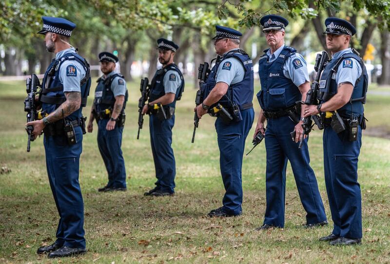 Police officers guard the area near Al Noor mosque. Getty Images