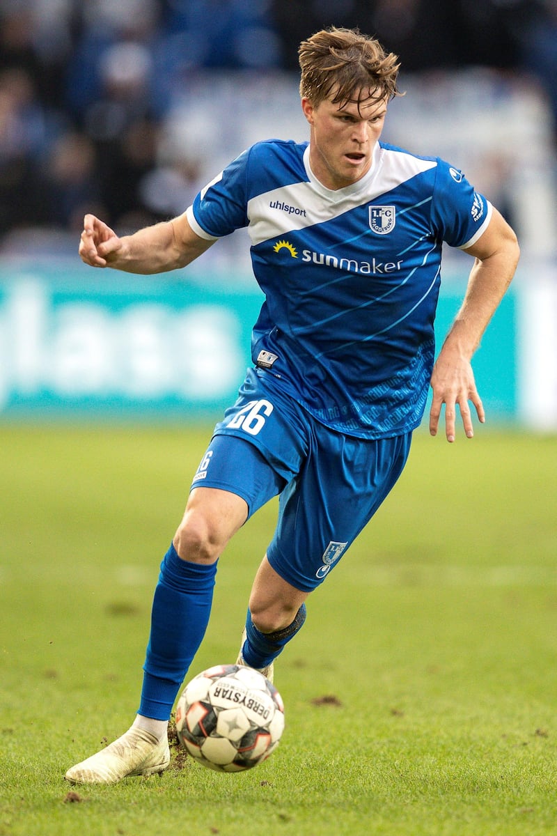 MAGDEBURG, GERMANY - DECEMBER 09: Marius Bulter #26 of 1.FC Magdeburg controls the ball during the Second Bundesliga match between 1. FC Magdeburg and 1. FC Union Berlin at MDCC Arena on December 9, 2018 in Magdeburg, Germany. (Photo by Maja Hitij/Bongarts/Getty Images)