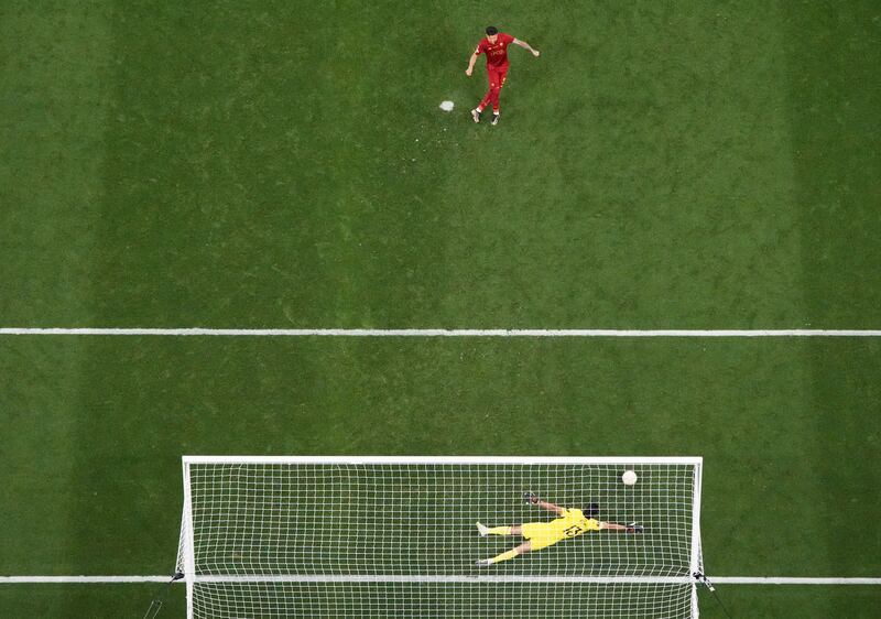 Sevilla's Bono saves a penalty from Roma's Roger Ibanez during the shoot-out. Reuters