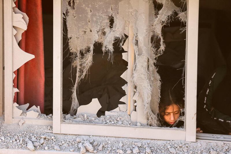 A damaged window at the Palestinian family house in Asker refugee camp. AFP