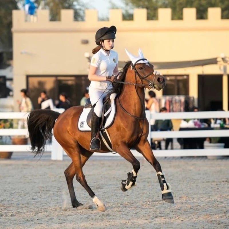 Savannah riding her horse in an equestrian event the day before she fell ill.