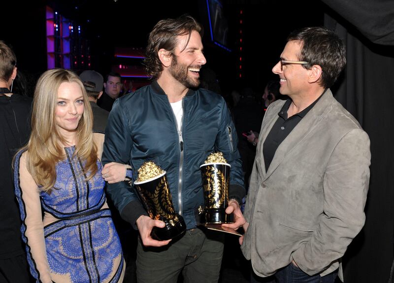 IMAGE DISTRIBUTED FOR MTV - Actor Bradley Cooper, center, winner of the best male performance and best kiss awards for "Silver Linings Playbook" poses backstage with actors Amanda Seyfried and Steve Carell at the MTV Movie Awards in Sony Pictures Studio Lot in Culver City, Calif., on Sunday April 14, 2013. (Photo by John Shearer/Invision for MTV/AP Images) *** Local Caption ***  2013 MTV Movie Awards - Audience & Backstage.JPEG-05b58.jpg