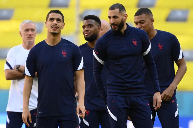 (From L) France's coach Didier Deschamps, France's forward Wissam Ben Yedder, France's midfielder Thomas Lemar, France's forward Karim Benzema and France's forward Kylian Mbappe attend an MD-1 training session at the Allianz Arena in Munich on June 14, 2021, on the eve of their UEFA EURO 2020 football match against Germany. / AFP / FRANCK FIFE
