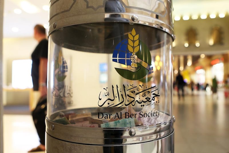 Charity box of Dar Al Ber Society outside one of the shop at Ibn Battuta Mall in Dubai. Pawan Singh / The National

