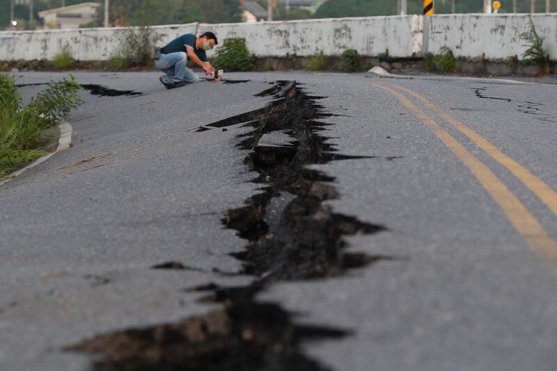 A jagged tear in a road after the quake hit Yuli township. EPA