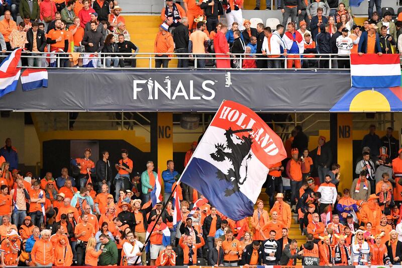 Netherlands fans cheer for their team prior to the start of the match. AP Photo