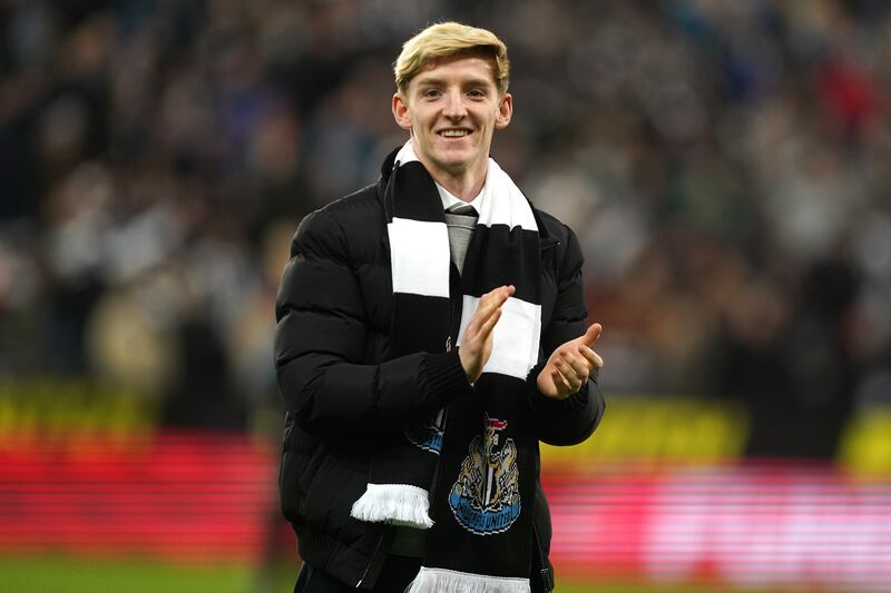 Newcastle's new signing Anthony Gordon applauds the fans before the match. PA