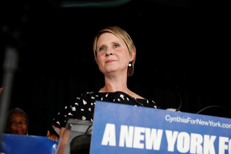 Democratic candidate for governor, Cynthia Nixon listens to cheers from supporters and attendees after conceding the primary at Cafe Omar in the Brooklyn borough of New York City, U.S., September 13, 2018.  REUTERS/Caitlin Ochs