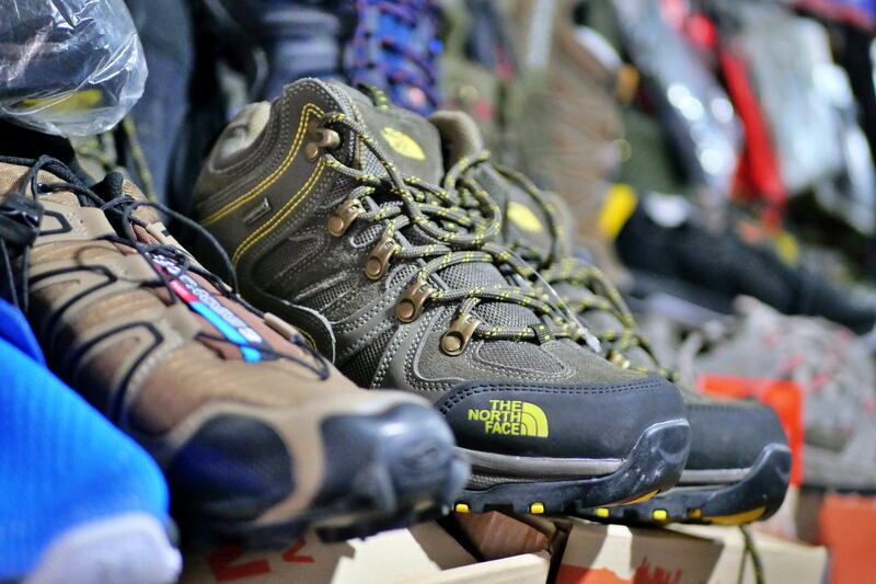 Pictured: Outdoor clothing is also available amongst the first aid kit and safety equipment at the centrally-located shop in Kabul. Photo by Charlie Faulkner