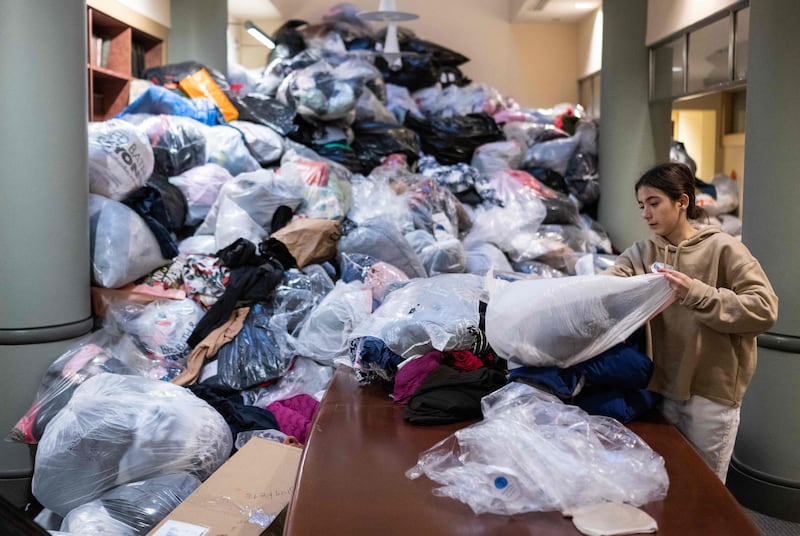 Nazli Goksoi helps sort donations at the Turkish Embassy in Washington, DC. AFP