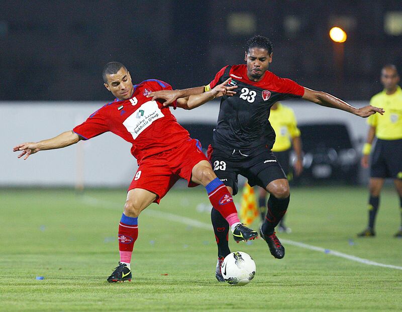 Ajman, United Arab Emirates-September  04, 2012;   Al Shaab (Red&Blue) and Emirate (Balck&Red) in action during the Pro League Round Robin tournament at the Ajman Football club in Ajman   . (  Satish Kumar / The National ) For Sports