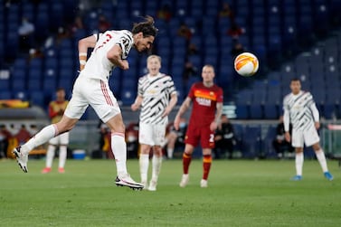 Manchester United's Edinson Cavani scores his side's second goal during the Europa League semifinal, second leg soccer match between Roma and Manchester United at Rome's Olympic stadium, Italy. AP