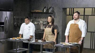 Bakers Adalberto Diaz, Carmen Portillo and Blake Jackson face host Buddy Valastro and advisors Erin McGinn and Vinnie Tubito during the round two tasting, as seen on Bake You Rich, Season 1.